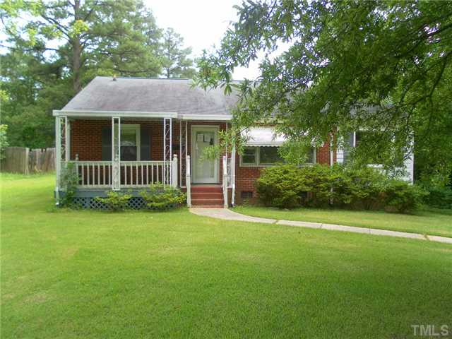 3032 Ross Road Durham, NC 27703 - Photo 2 of 11 a view of a house with a yard