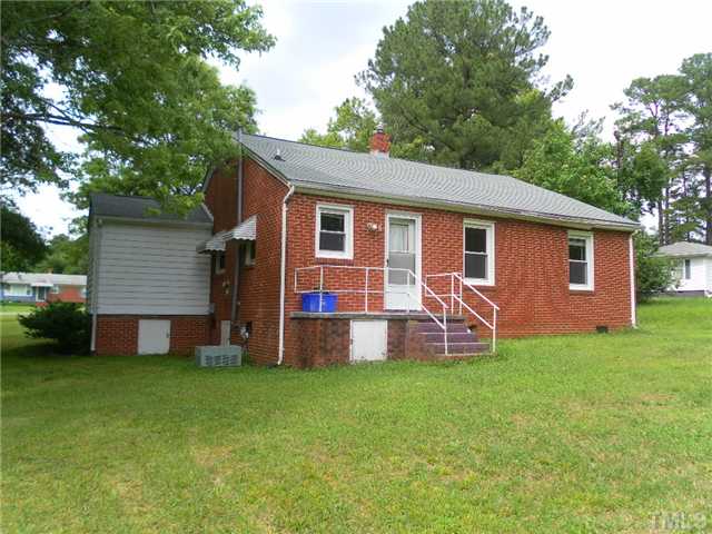 3032 Ross Road Durham, NC 27703 - Photo 4 of 11 a front view of house with yard and green space