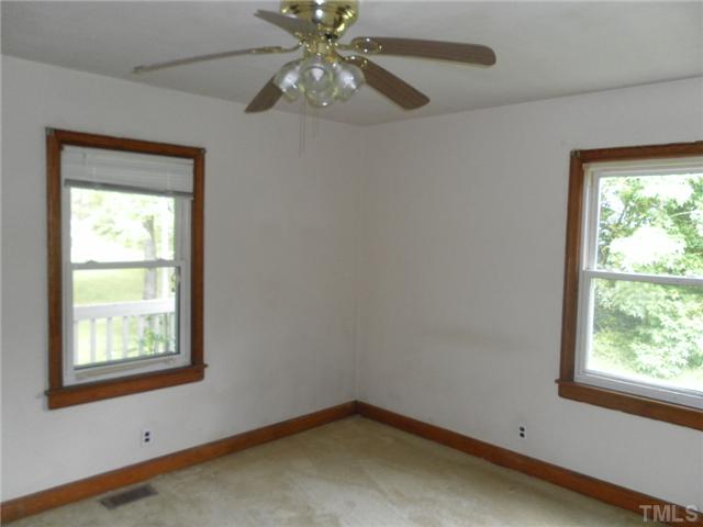 3032 Ross Road Durham, NC 27703 - Photo 8 of 11 an empty room with a window