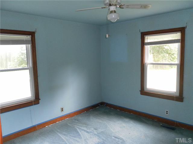 3032 Ross Road Durham, NC 27703 - Photo 9 of 11 an empty room with a window
