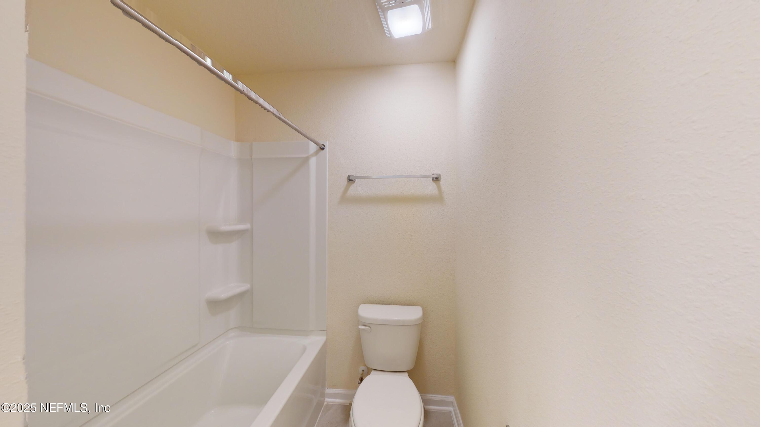 67 Oarsman Xing Drive St. Augustine, FL 32095 - Photo 16 of 33 a bathroom with a toilet and a shower