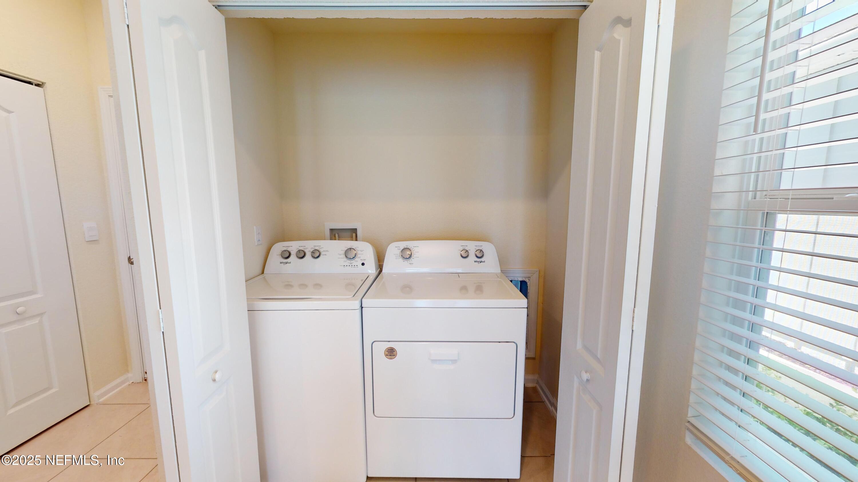 67 Oarsman Xing Drive St. Augustine, FL 32095 - Photo 20 of 33 a utility room with dryer and washer