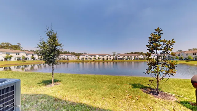 a view of a lake with a big yard
