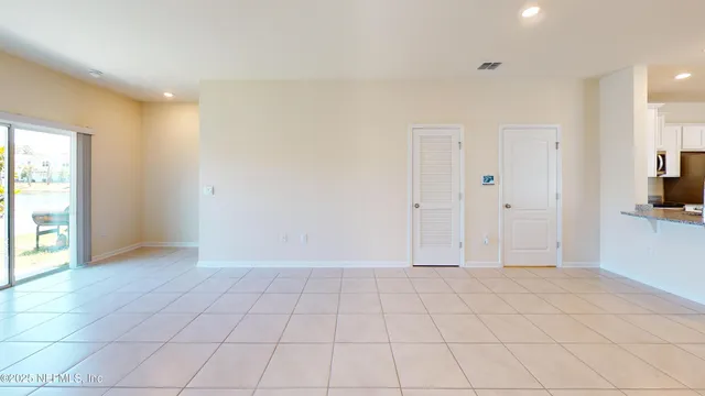 a view of an empty room and window