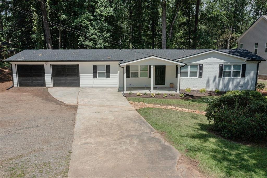 1325 County Line Road Northwest Acworth, GA 30101 - Photo 1 of 1 a front view of a house with yard