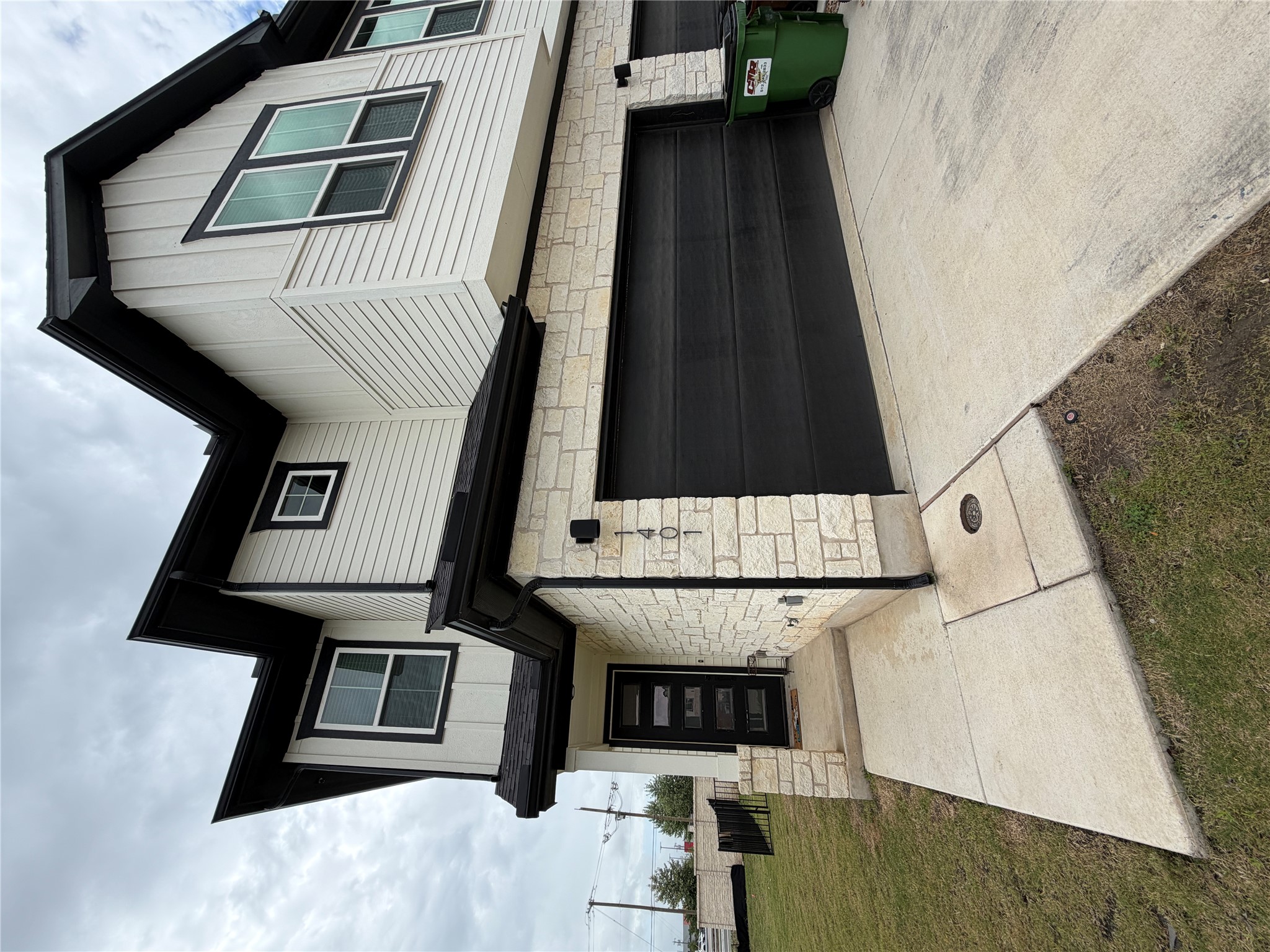 2600 Gattis School Road, Unit 1401 Round Rock, TX 78664 - Photo 2 of 33 a front view of a house with garage
