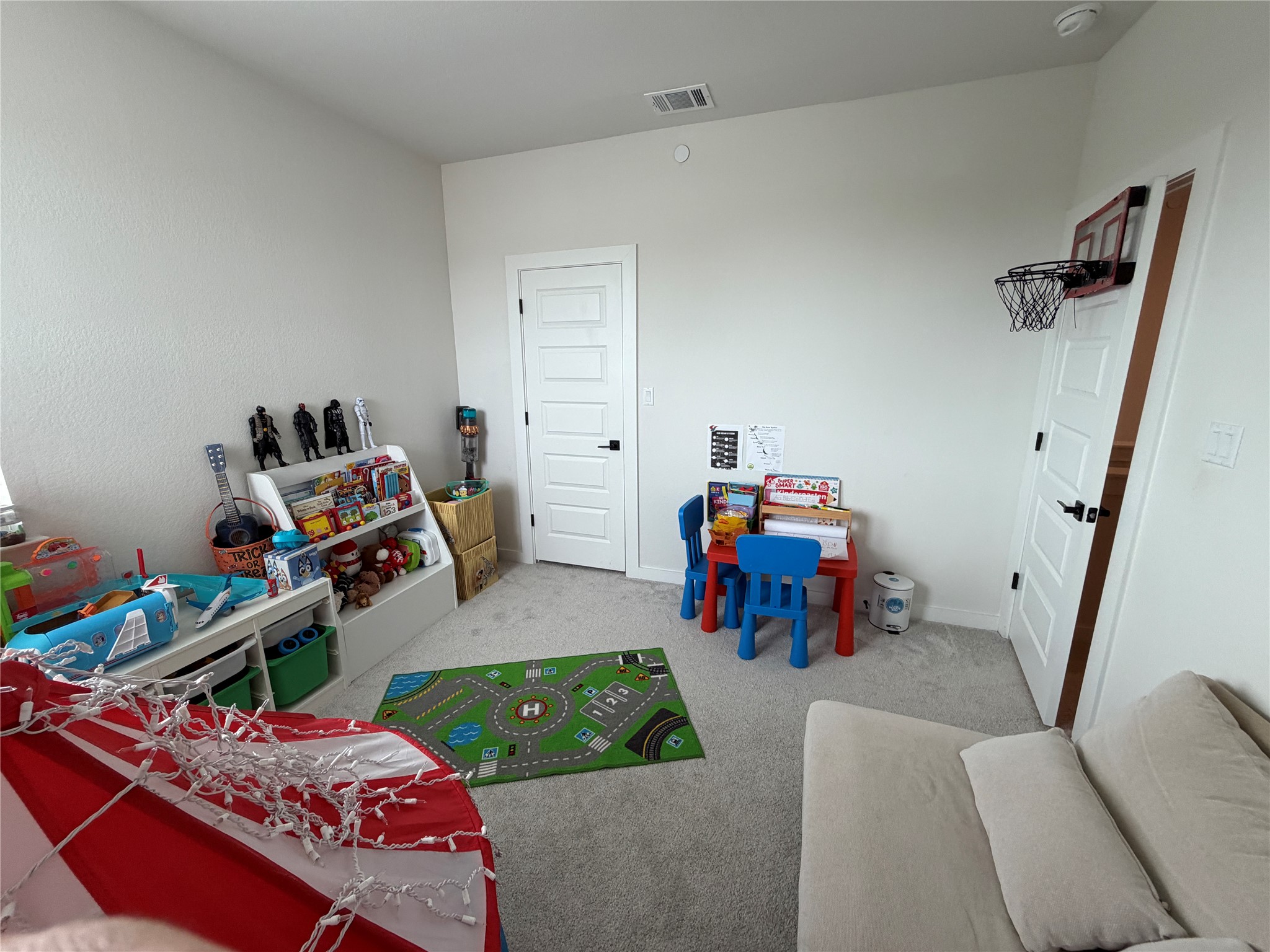 2600 Gattis School Road, Unit 1401 Round Rock, TX 78664 - Photo 28 of 33 a bedroom with bed and a wooden floor