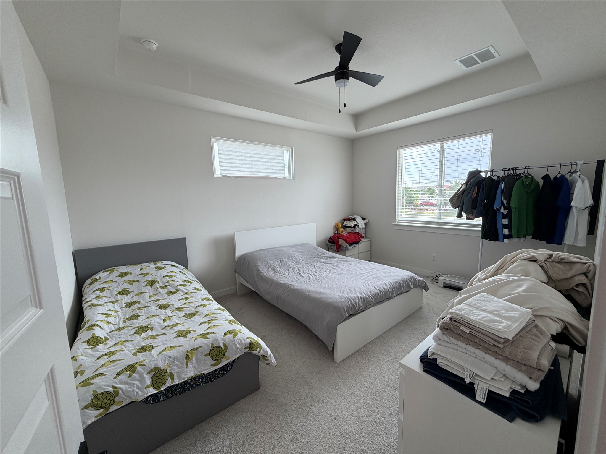 2600 Gattis School Road, Unit 1401 Round Rock, TX 78664 - Photo 6 of 33 a bedroom with two beds and a window