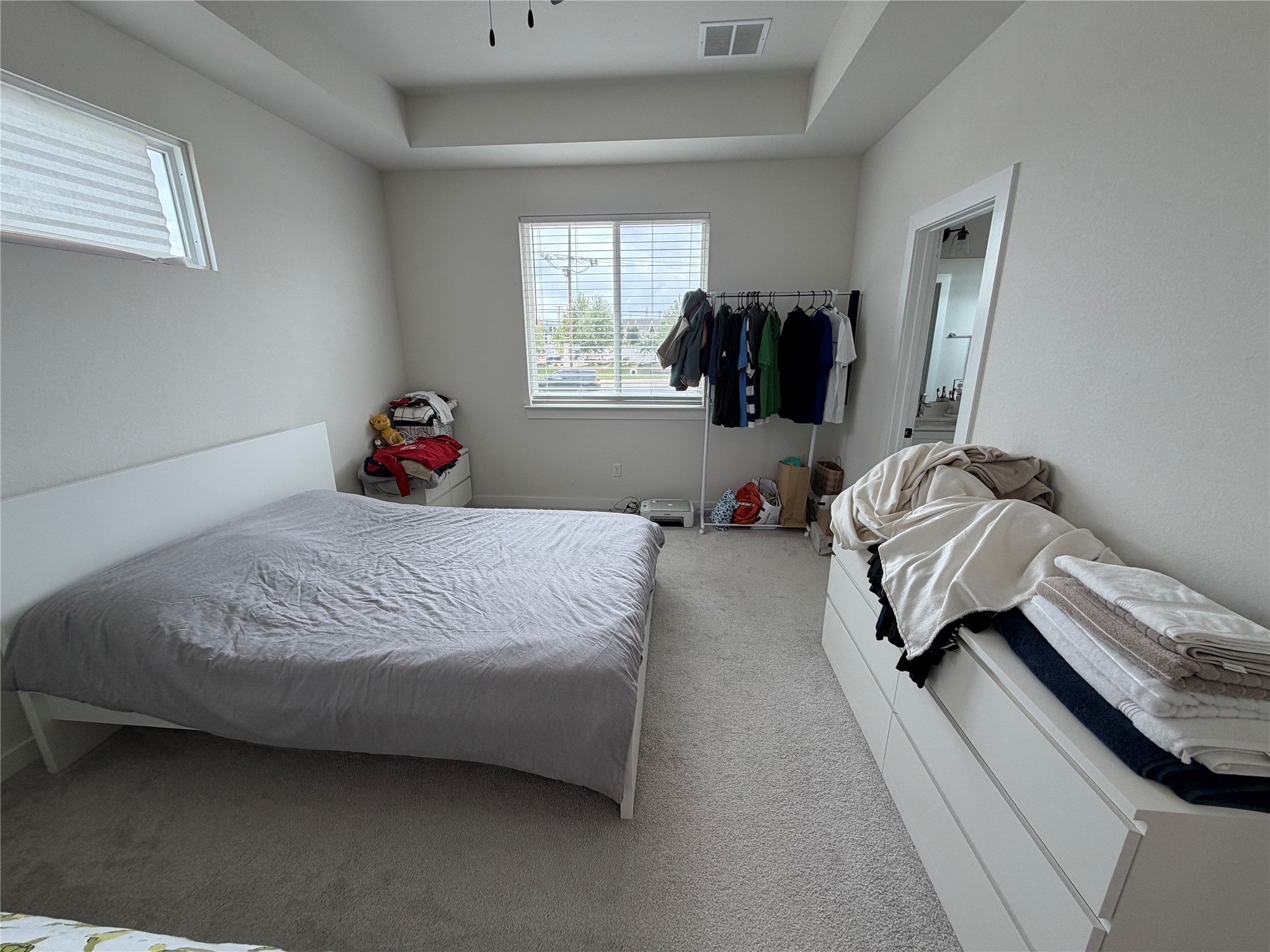 2600 Gattis School Road, Unit 1401 Round Rock, TX 78664 - Photo 7 of 33 a bed room with a bed and a couch