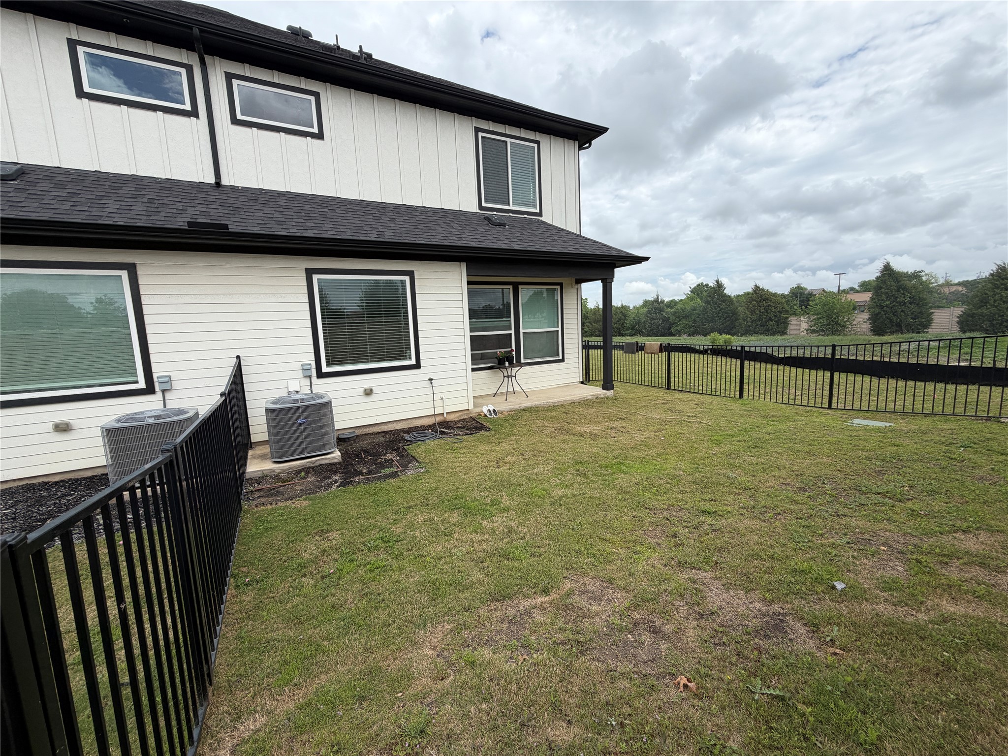 2600 Gattis School Road, Unit 1401 Round Rock, TX 78664 - Photo 8 of 33 a view of a house with backyard and deck