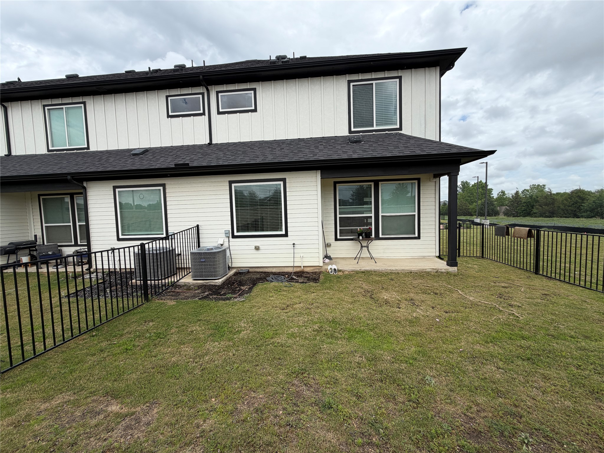 2600 Gattis School Road, Unit 1401 Round Rock, TX 78664 - Photo 9 of 33 a house with yard in front of it
