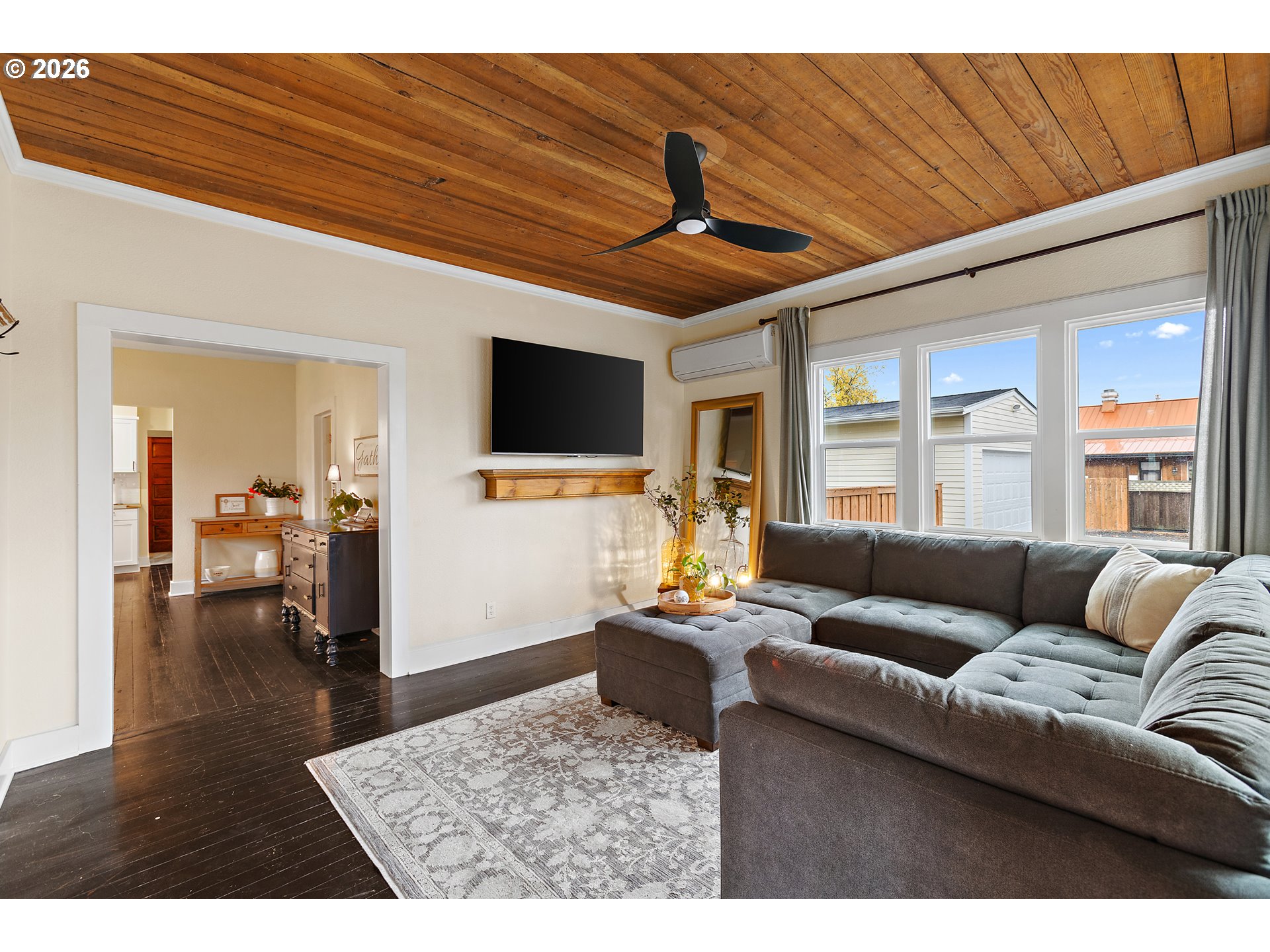 36937 Highway 213 Mount Angel, OR 97362 - Photo 13 of 43 a living room with furniture and a flat screen tv