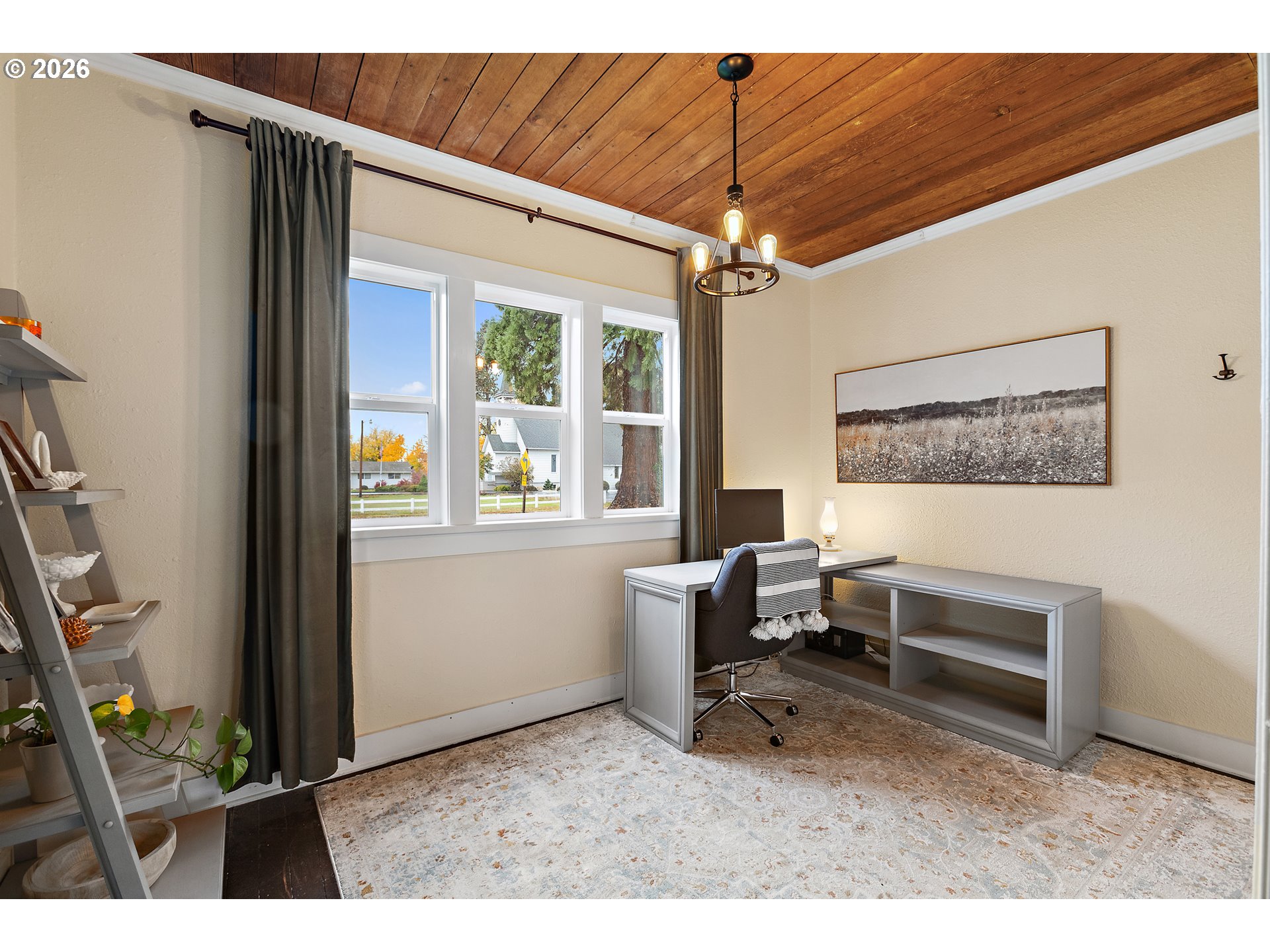 36937 Highway 213 Mount Angel, OR 97362 - Photo 5 of 43 a living room with furniture a flat screen tv and a window