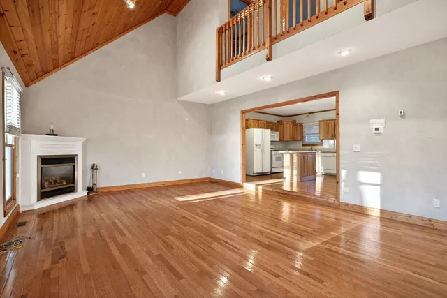 a kitchen with a sink a refrigerator a washer and dryer