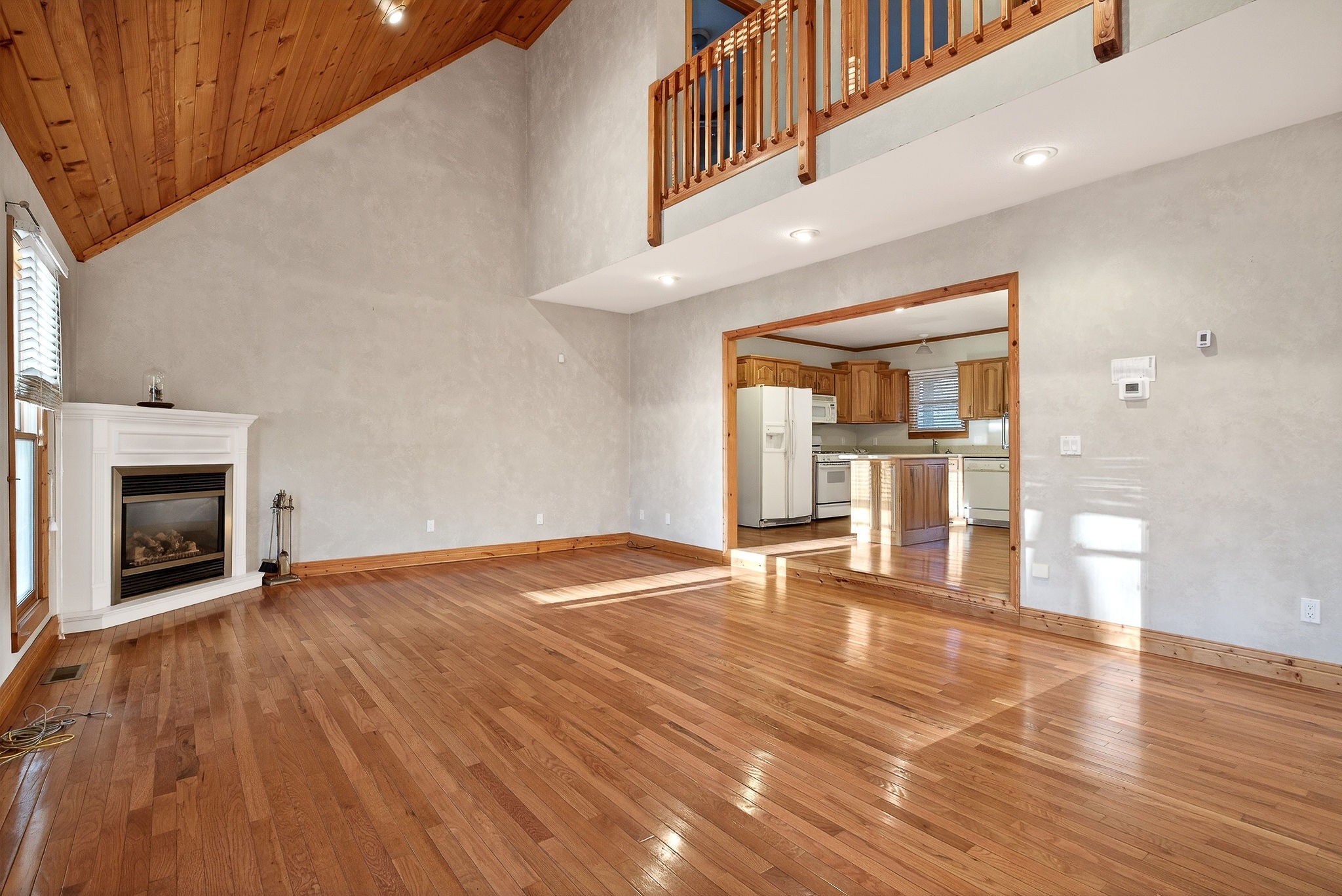 1011 Low Gap Road Sparta, TN 38583 - Photo 14 of 76 a view of empty room with wooden floor and fireplace