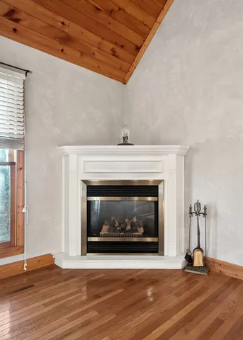 a kitchen with stainless steel appliances a refrigerator and a stove top oven