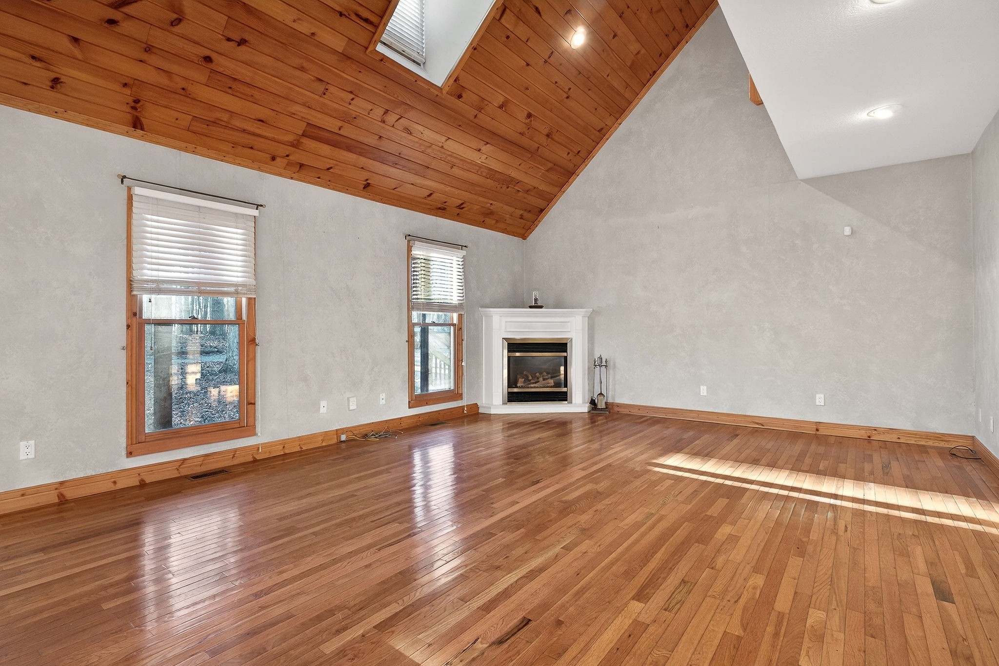 1011 Low Gap Road Sparta, TN 38583 - Photo 16 of 76 a view of empty room with wooden floor and fireplace