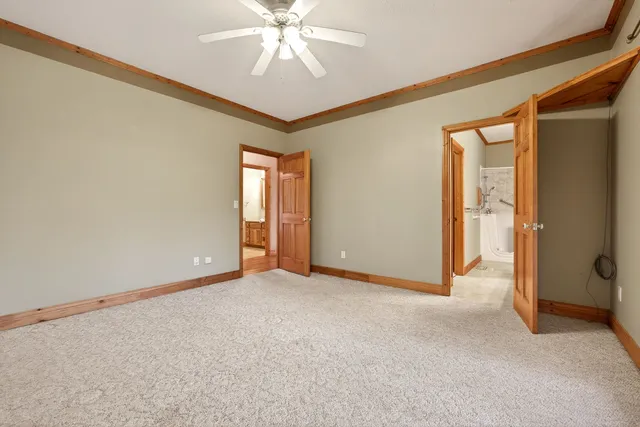 a bed room with a bed and a window