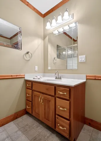 a bathroom with a bath tub with a shower