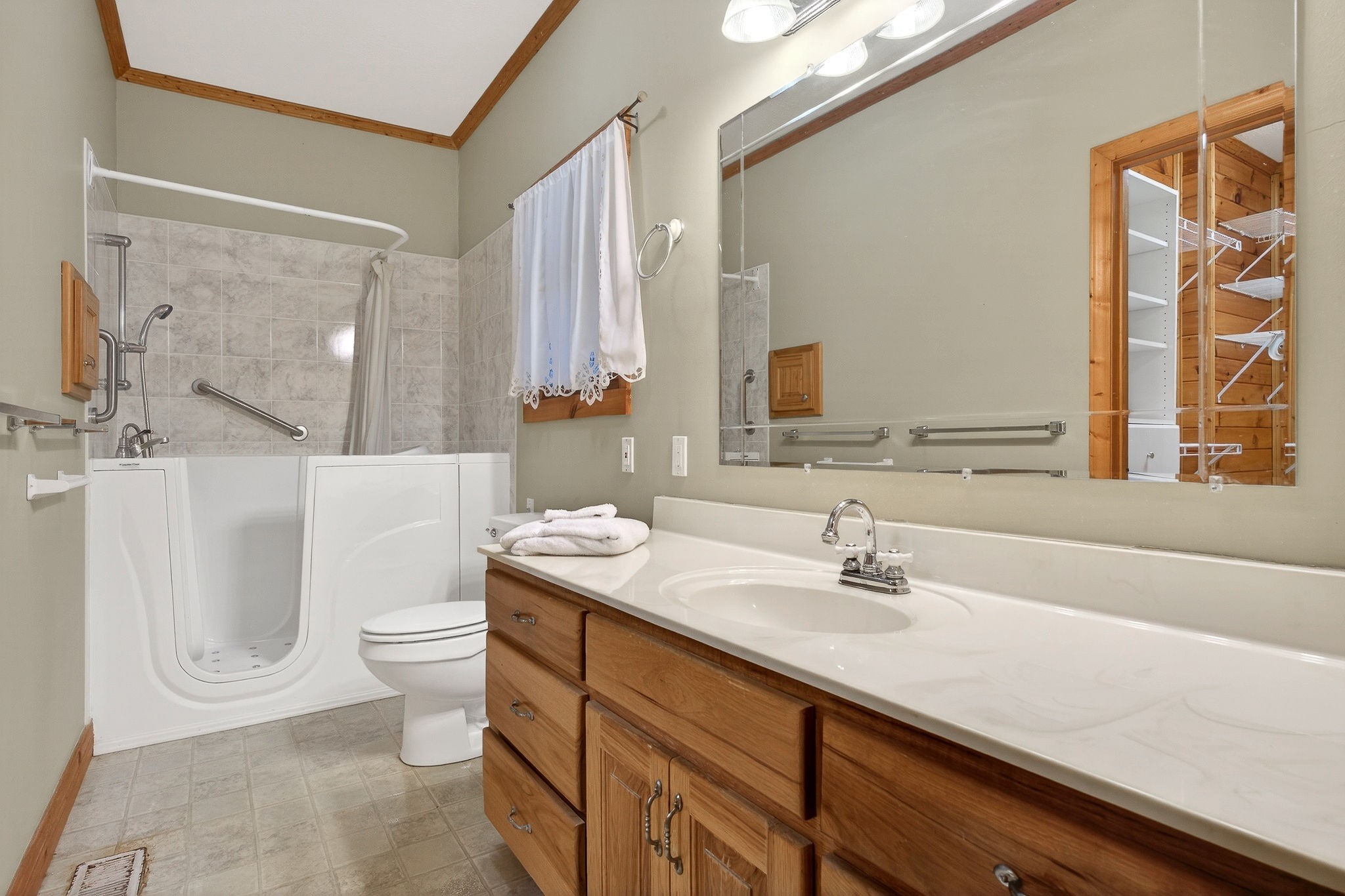1011 Low Gap Road Sparta, TN 38583 - Photo 27 of 76 a bathroom with a sink toilet a mirror and shower