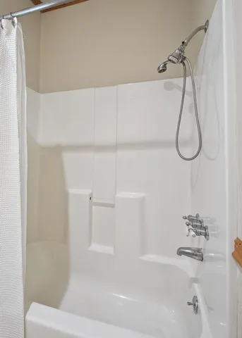 a view of a lake with a yard