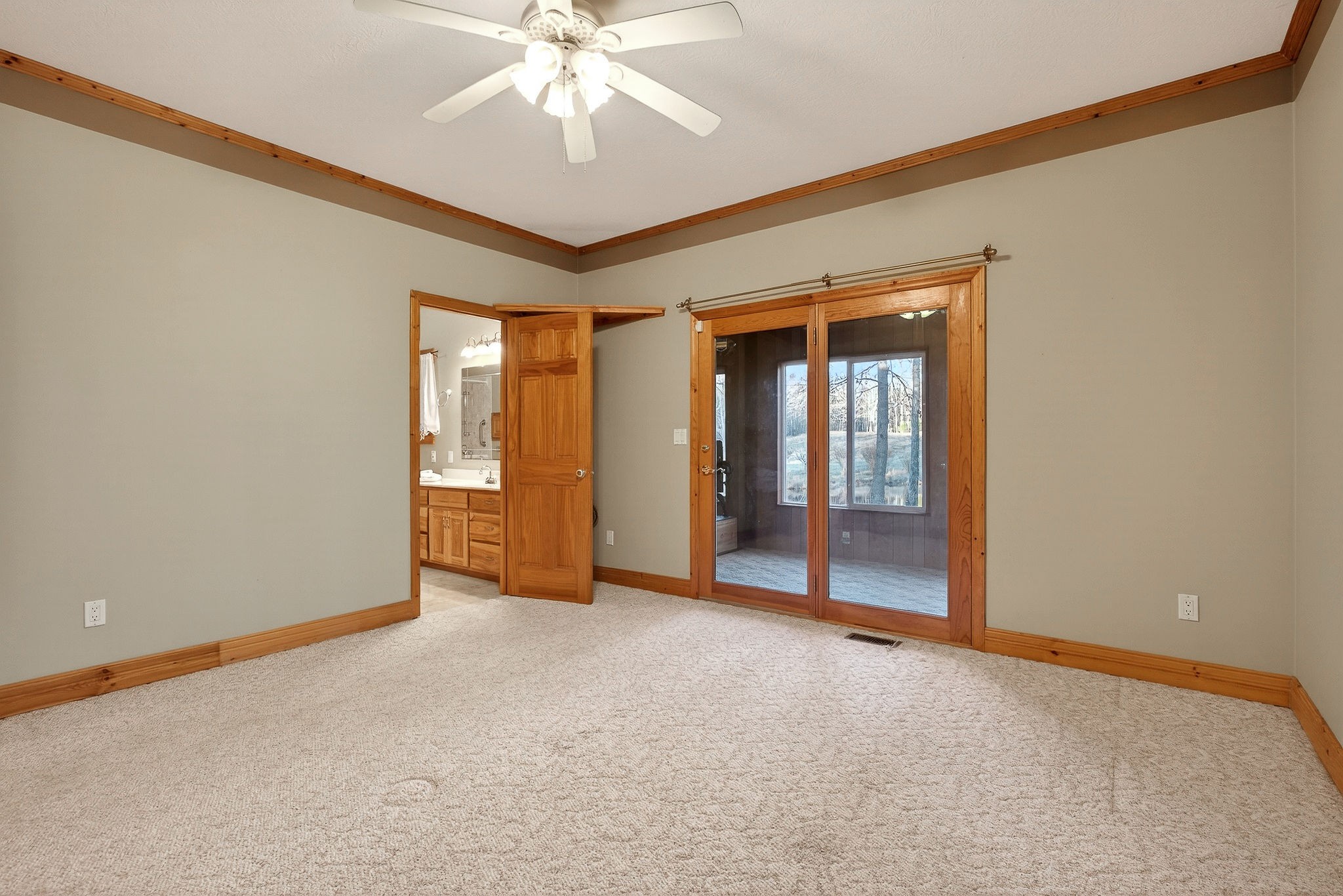 1011 Low Gap Road Sparta, TN 38583 - Photo 39 of 76 a view of an empty room with chandelier fan and fire place