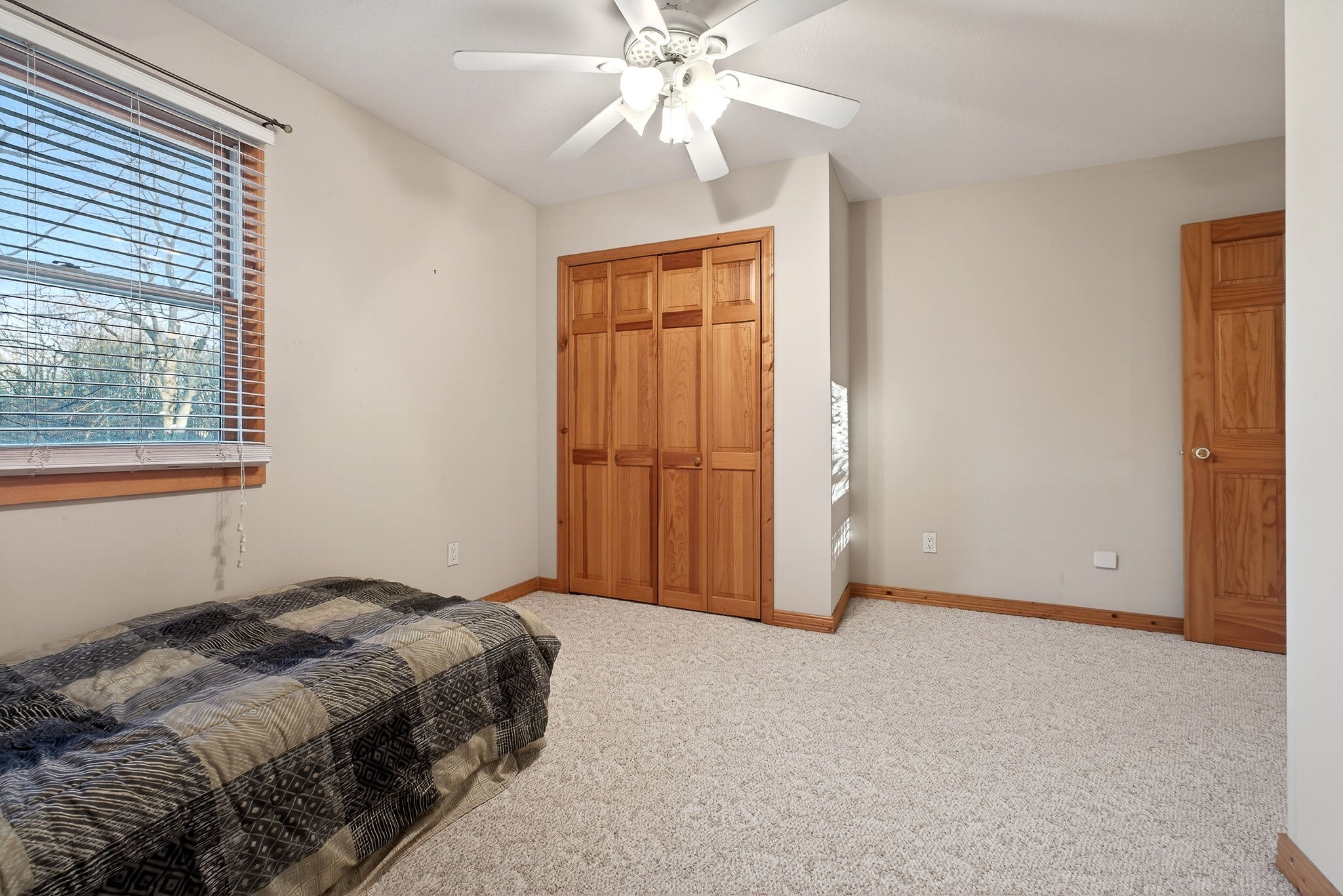 1011 Low Gap Road Sparta, TN 38583 - Photo 40 of 76 a bedroom with a bed and a chandelier