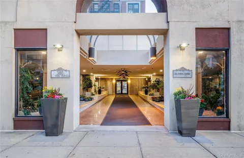 a terrace with a city view