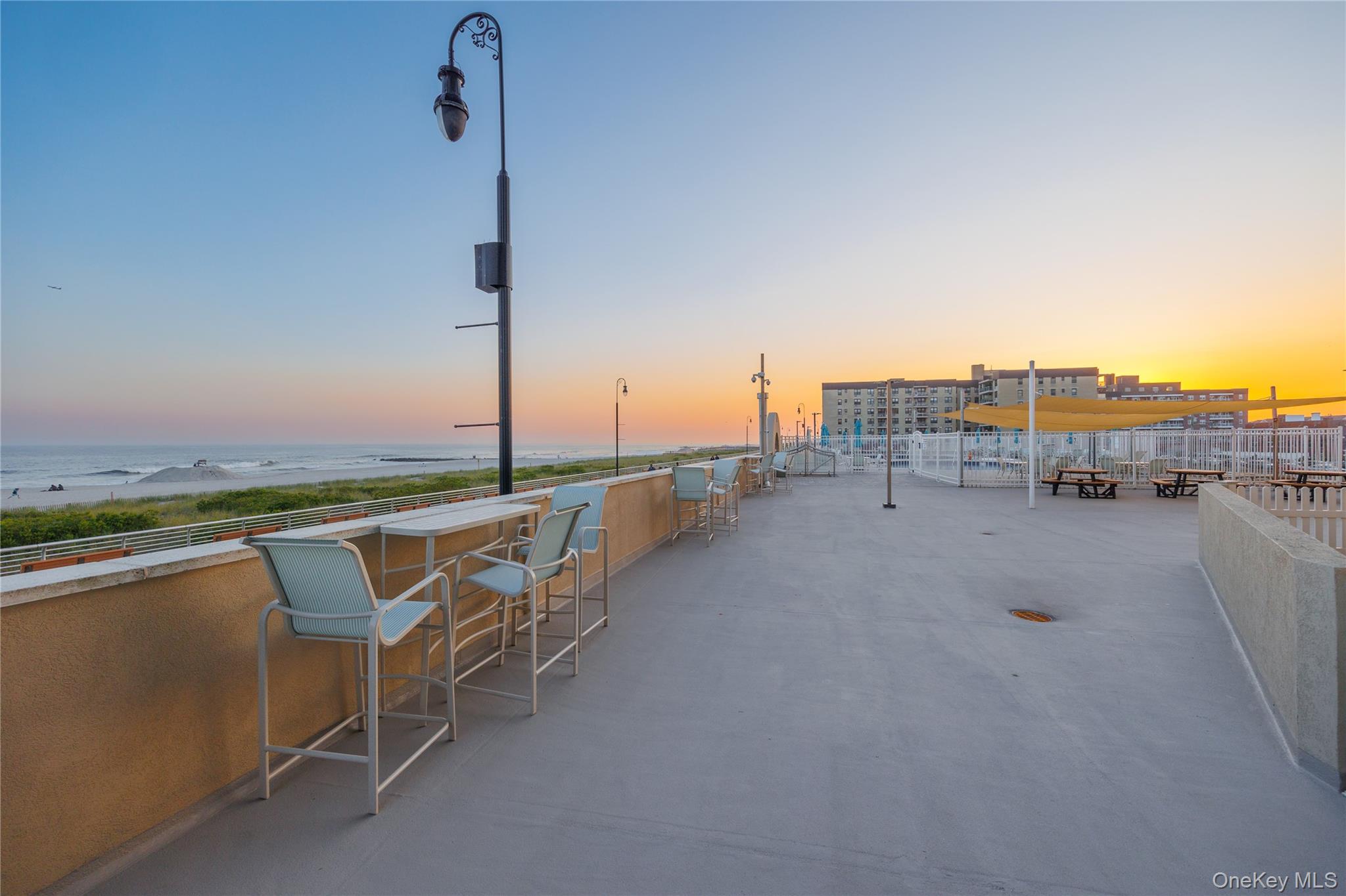 360 Shore Road, Unit 8L Long Beach, NY 11561 - Photo 12 of 12 a terrace with a city view