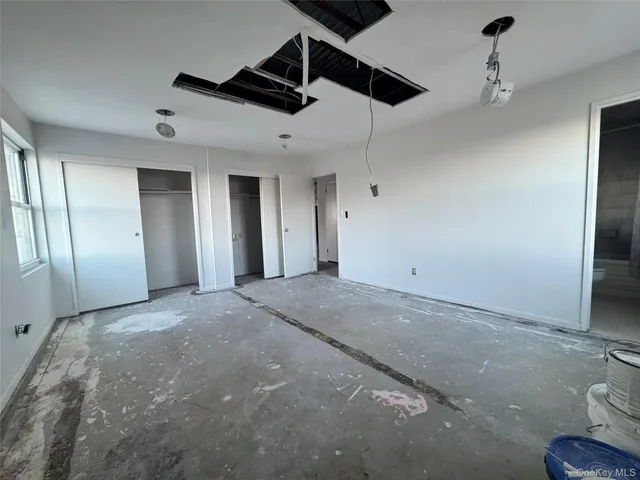 a bathroom with a sink toilet tub and shower