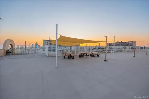 a view of a swimming pool with a terrace
