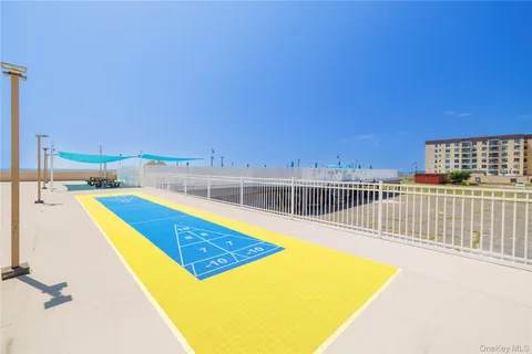 a view of parking garage with cars