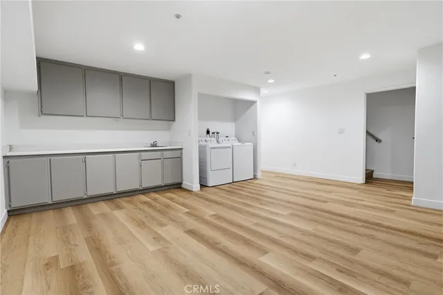 a view of a kitchen with a sink