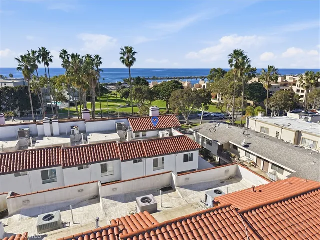 an aerial view of a houses with outdoor space