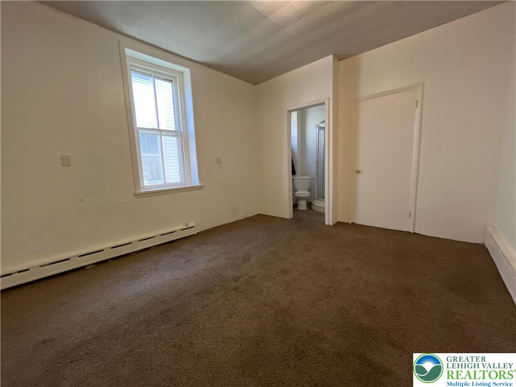 29 2nd Street, Unit 1R Catasauqua, PA 18032 - Photo 2 of 7 an empty room with windows