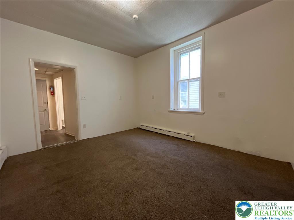 29 2nd Street, Unit 1R Catasauqua, PA 18032 - Photo 3 of 7 an empty room with a window