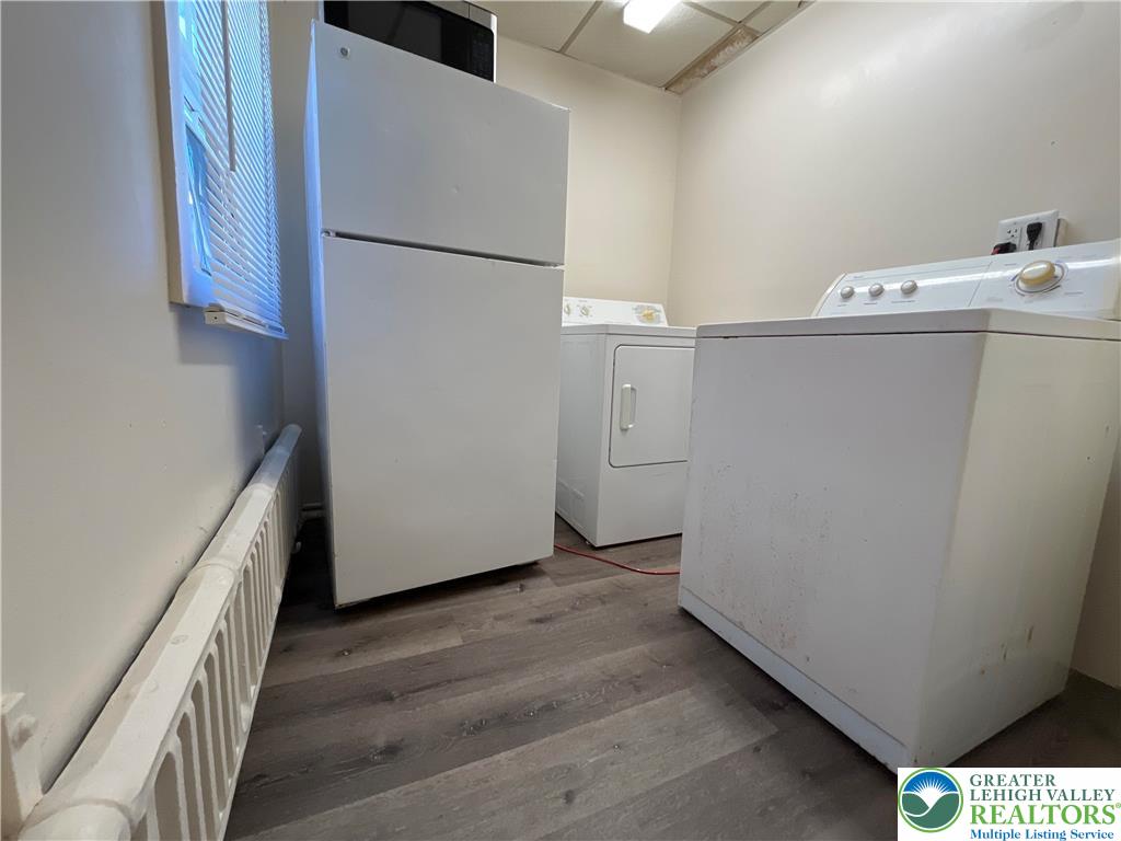29 2nd Street, Unit 1R Catasauqua, PA 18032 - Photo 5 of 7 a view of storage and utility room with a refrigerator