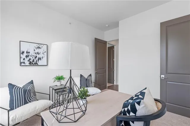 a view of a livingroom with furniture