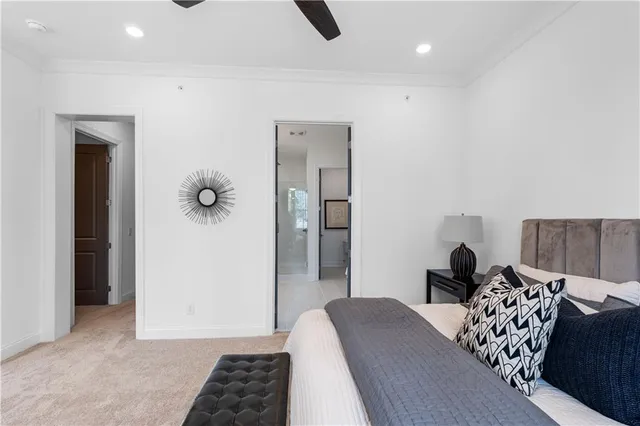 a bedroom with furniture and a window