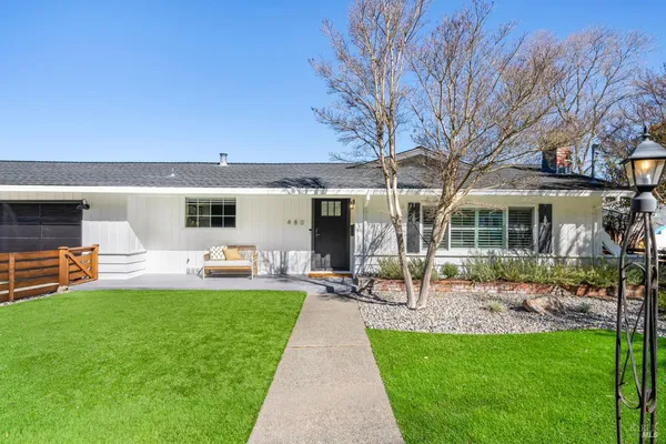 front view of a house with a yard