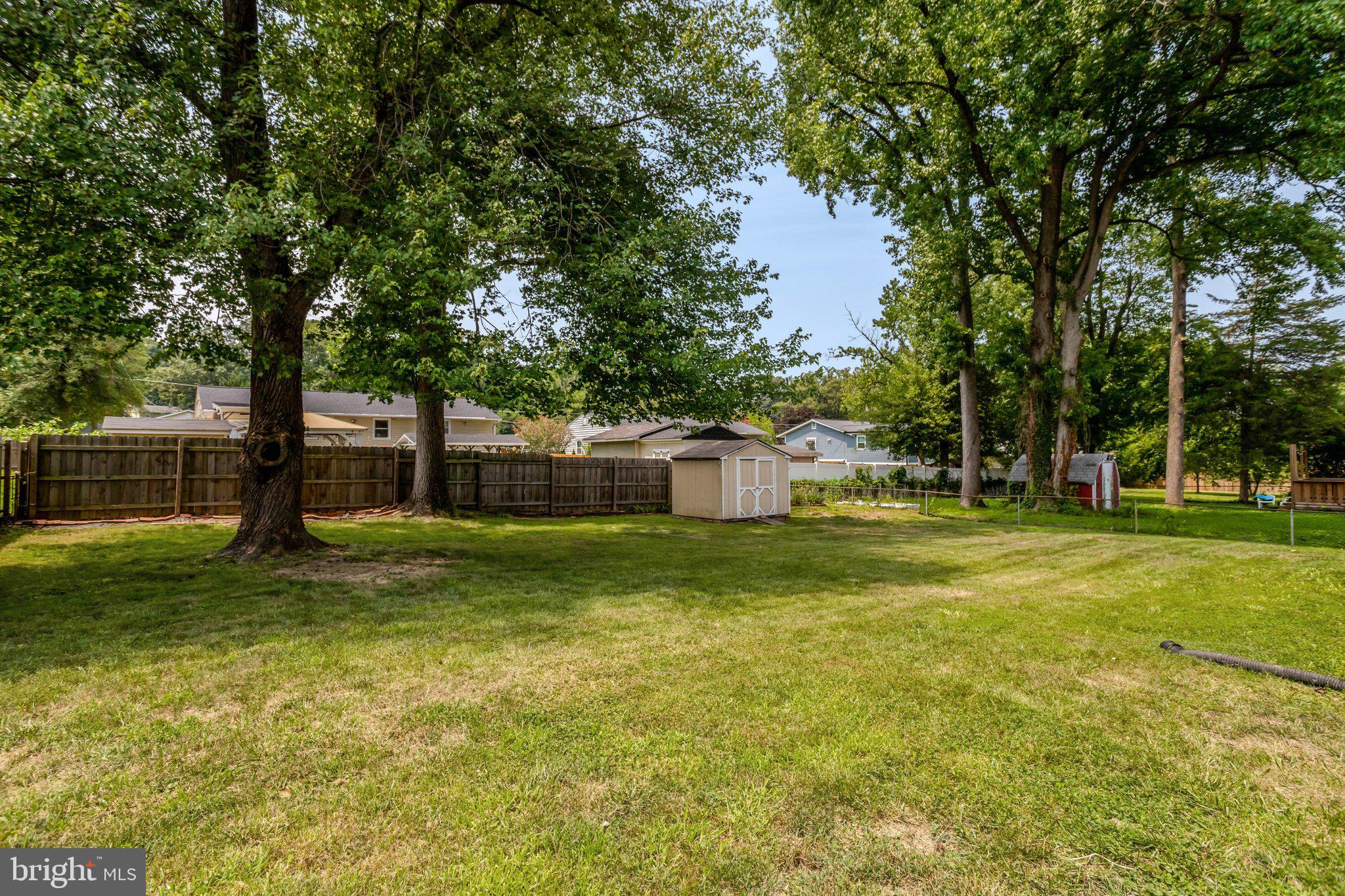 8824 Jandell Road Lorton, VA 22079 - Photo 39 of 46 Large backyard with shed
