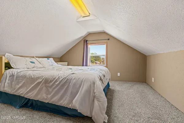 a view of a garden with a fountain