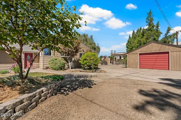 a view of a house with a garden
