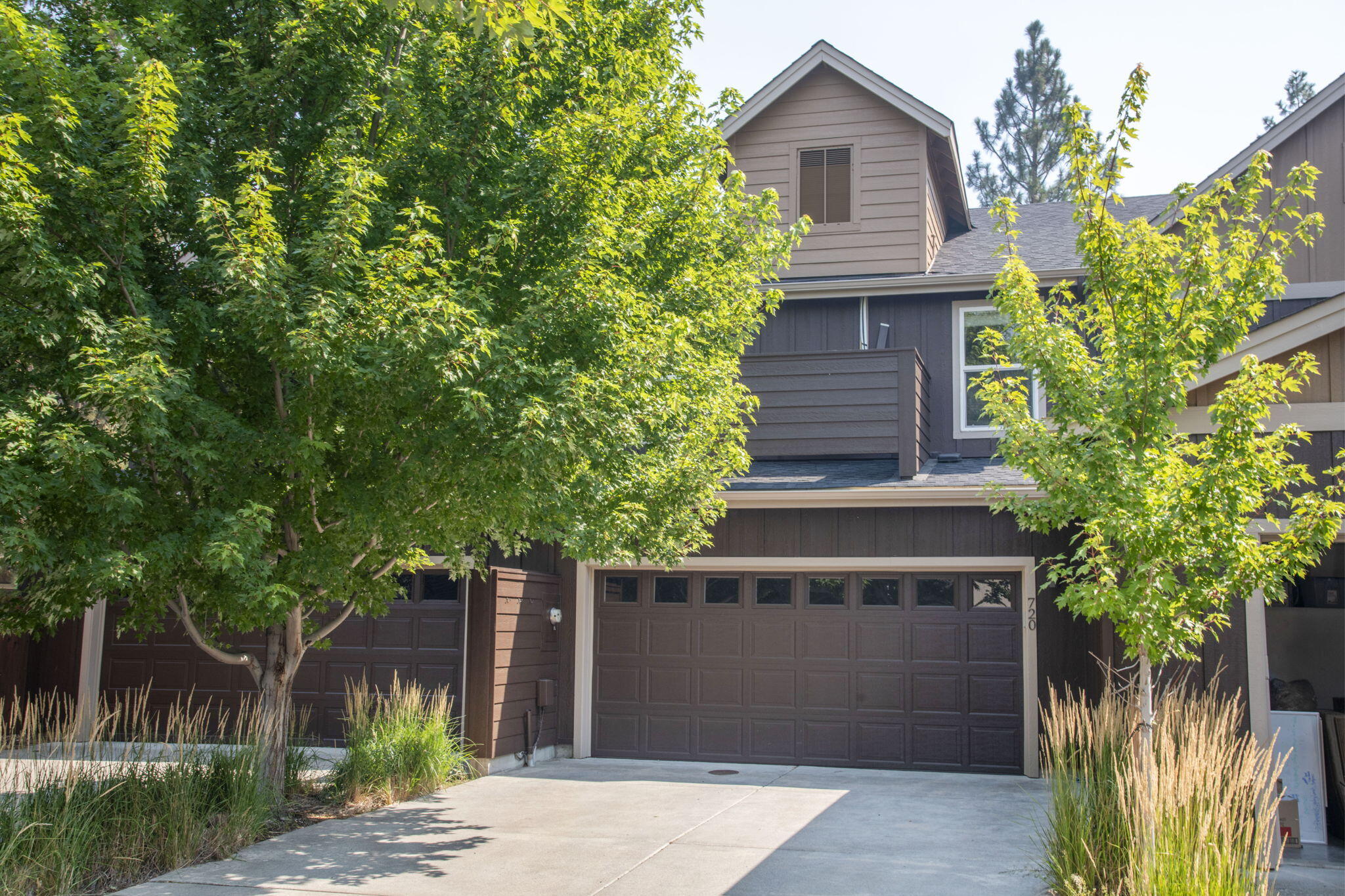 720 North Hindeman Street Sisters, OR 97759 - Photo 21 of 25 a front view of a house with a garden