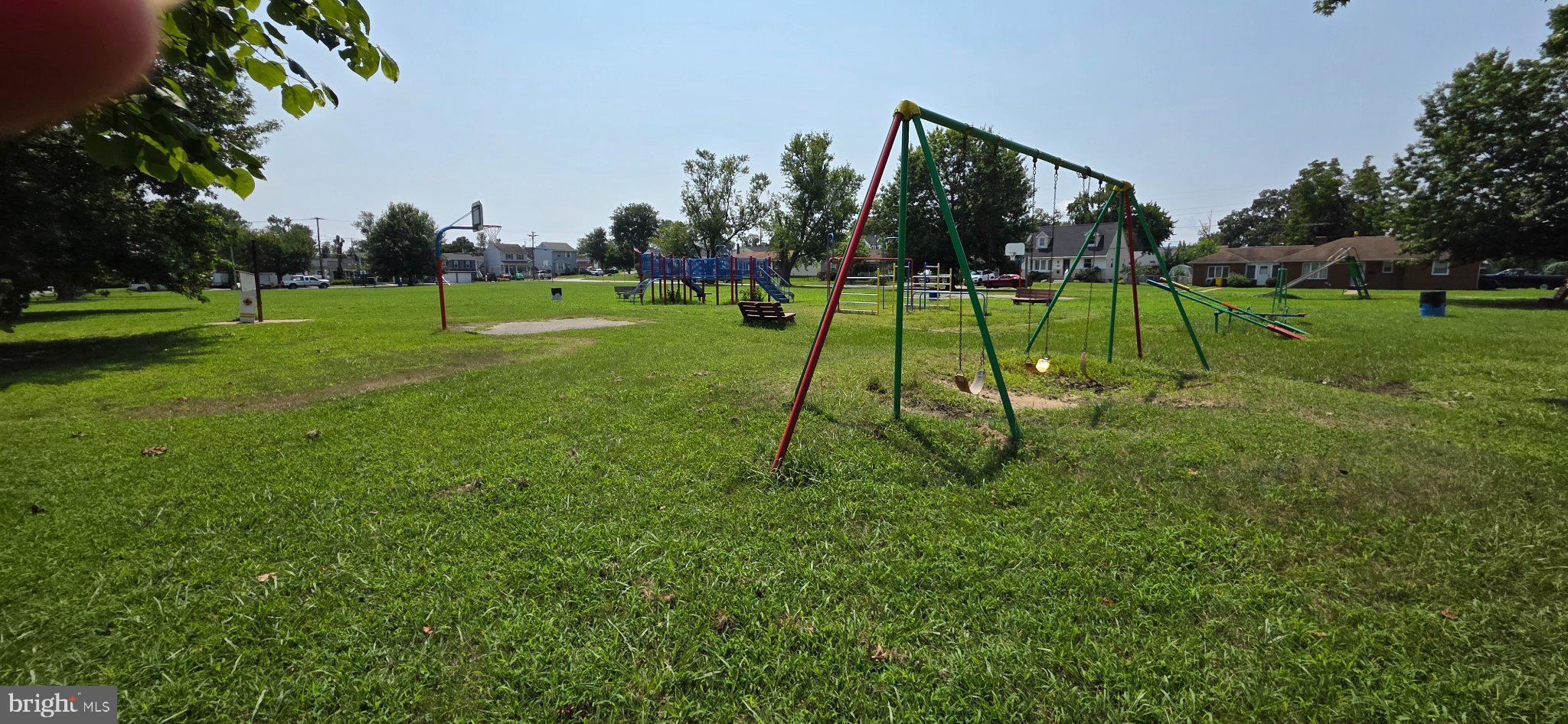 8418 Geneva Road Pasadena, MD 21122 - Photo 48 of 53 Sunny day at the playground on Geneva Road