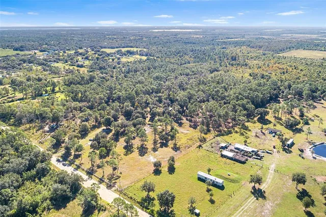 a view of city view with lot of car parked