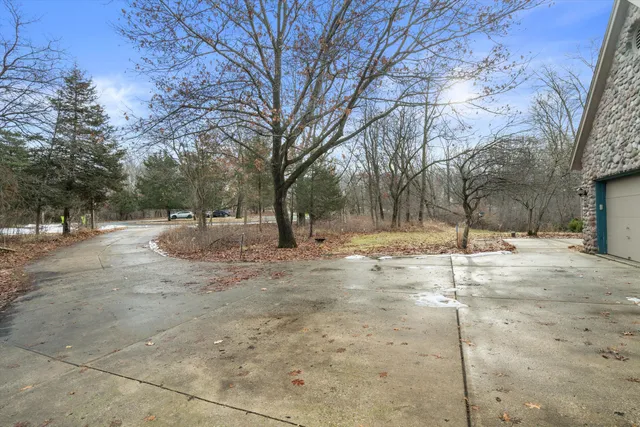 $835,000 | 1249 North Lost Woods Road, Summit, WI 53066