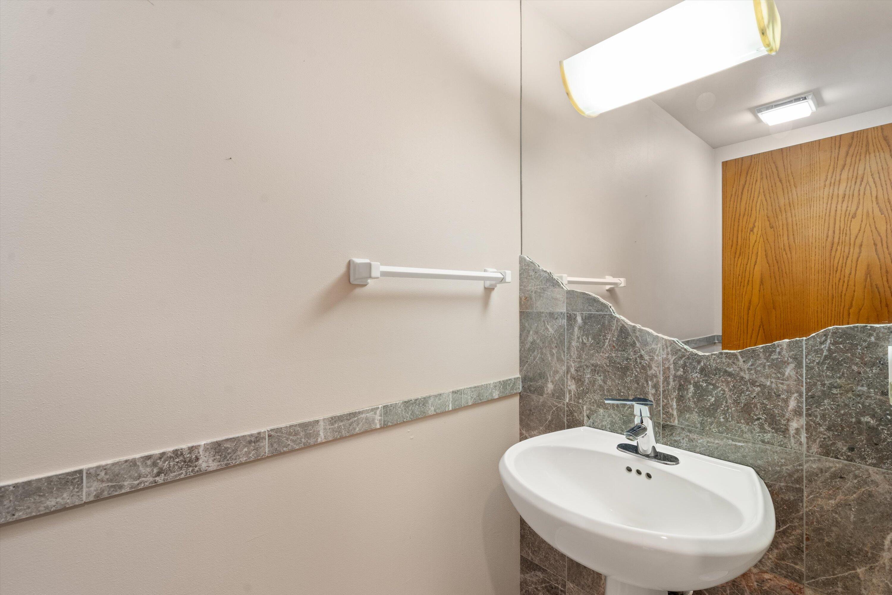 1249 North Lost Woods Road Summit, WI 53066 - Photo 45 of 79 Half Bath on Main Level