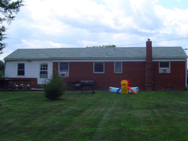 7464 Spring Creek Road Bridgewater, VA 22812 - Photo 2 of 9 a view of a house with backyard