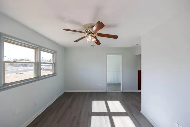 a view of an empty room and window